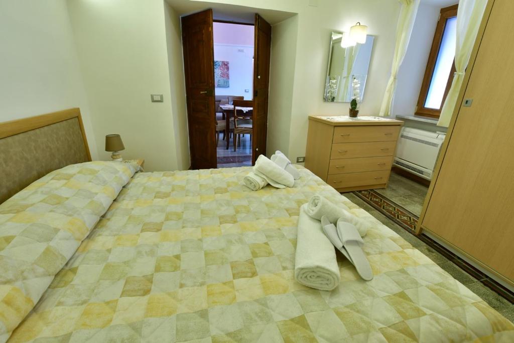 Łóżko lub łóżka w pokoju w obiekcie Il Centro Storico Ravello