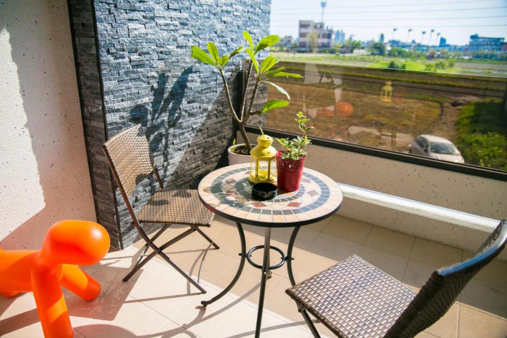 A balcony or terrace at 澳玩客電梯民宿