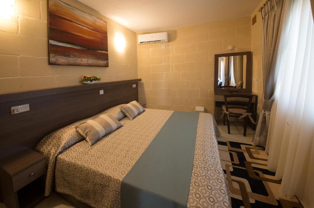 Postel nebo postele na pokoji v ubytování Quayside Apartments