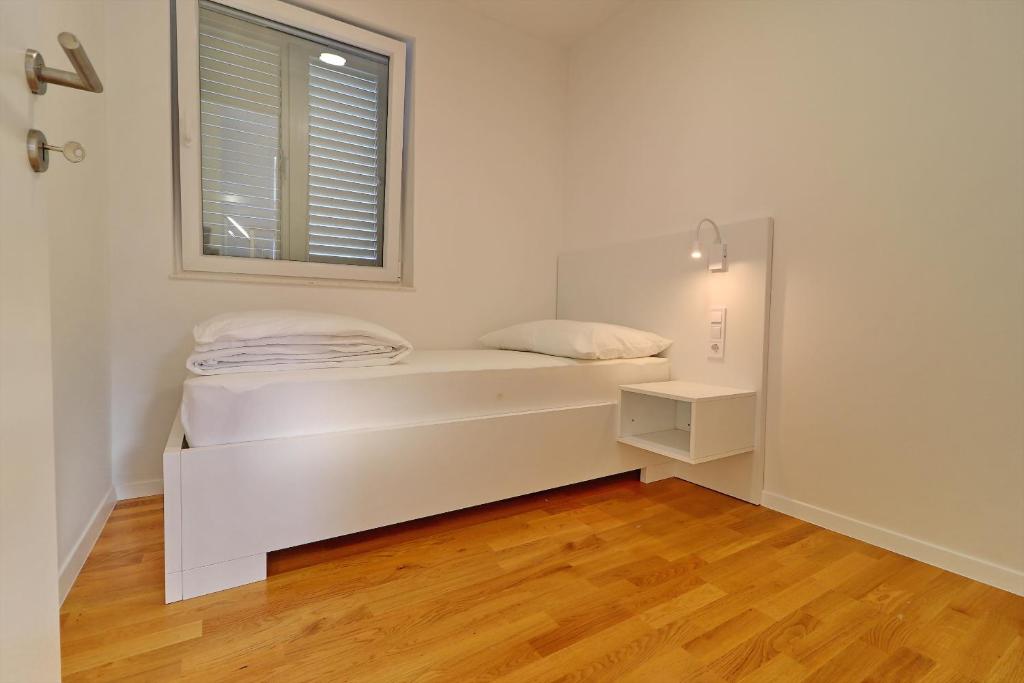 Posteľ alebo postele v izbe v ubytovaní Villa Dalmatinka