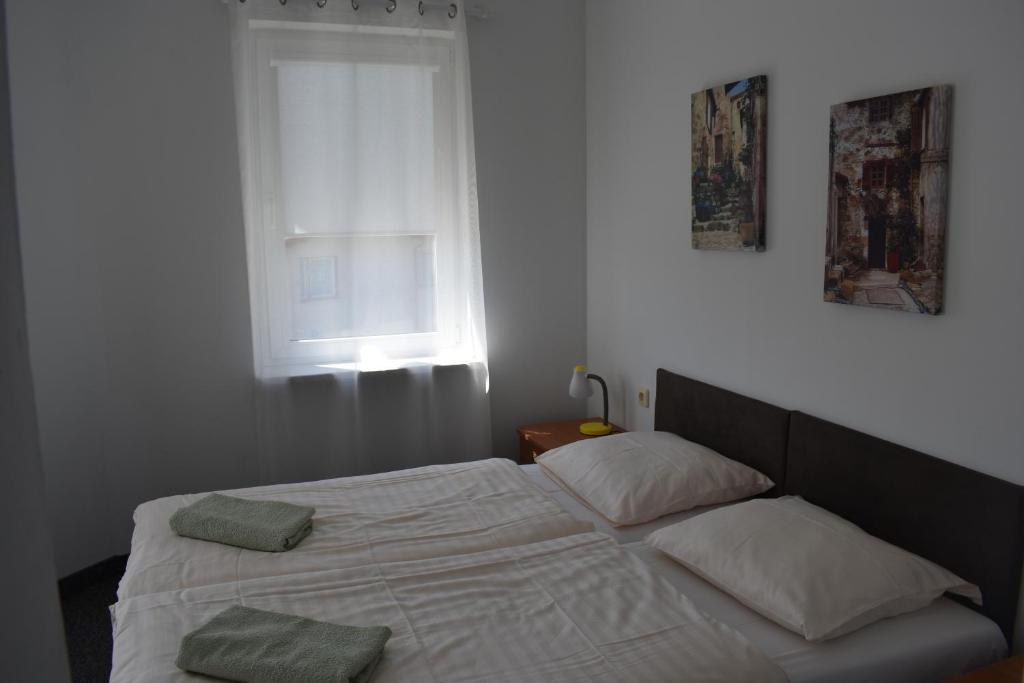 Postel nebo postele na pokoji v ubytování Eden