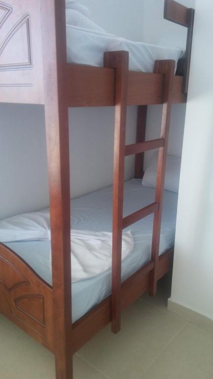 Postel nebo postele na pokoji v ubytování Aira Apartment
