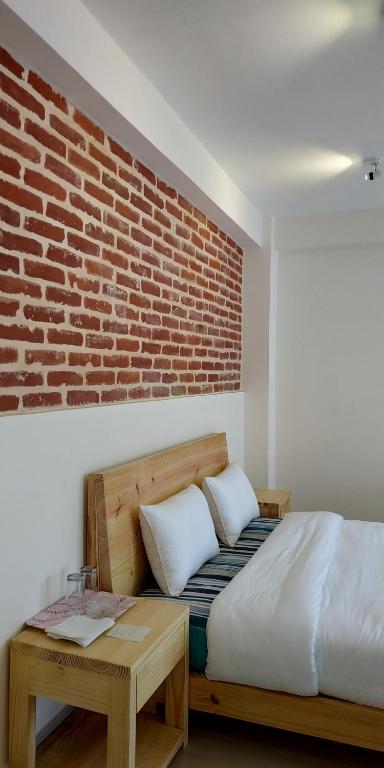 Postel nebo postele na pokoji v ubytování Sayami Home