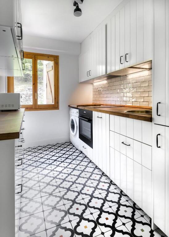 Kuchyň nebo kuchyňský kout v ubytování Duplex para 12 Panticosa