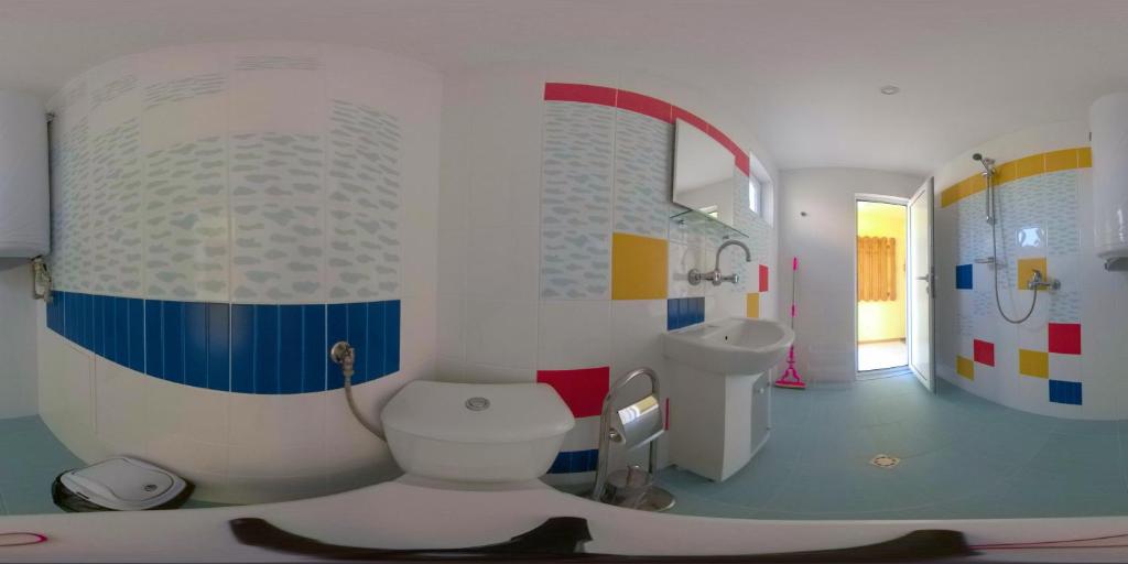 Koupelna v ubytování Daskalov Bungalows