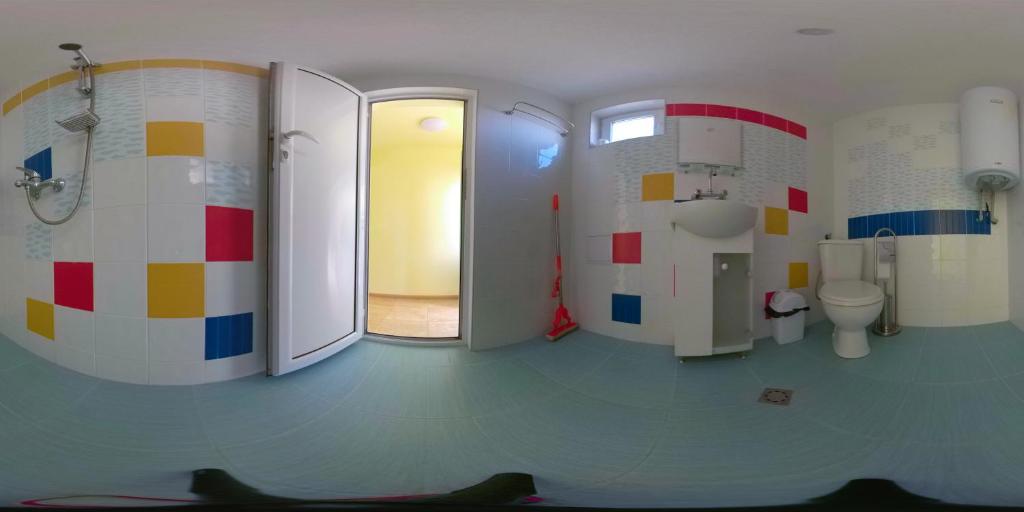 Koupelna v ubytování Daskalov Bungalows