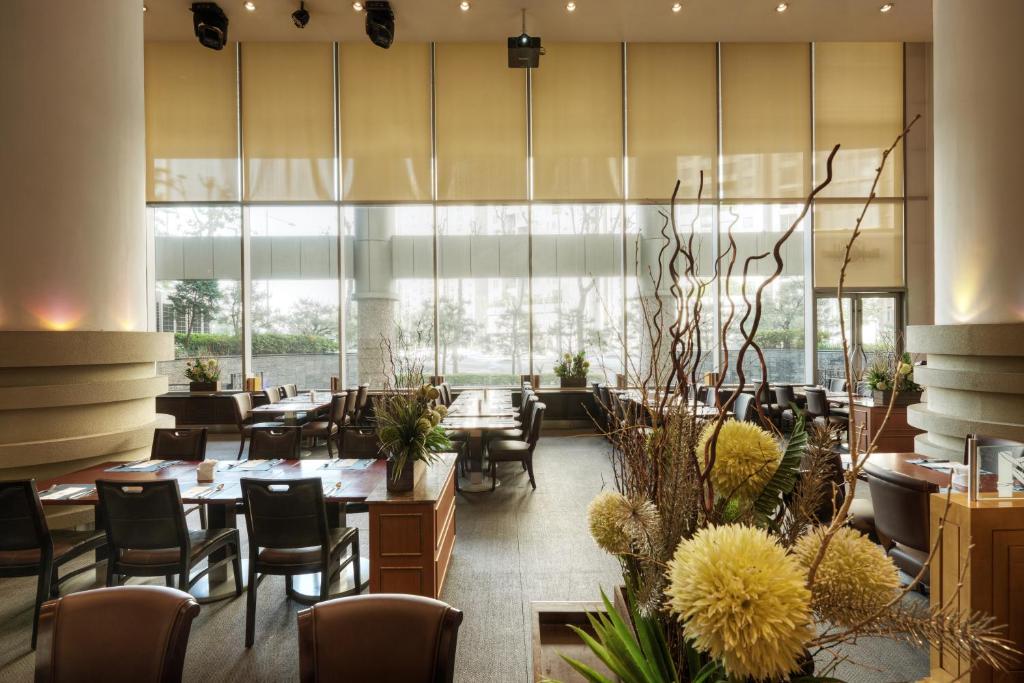 Uma área de estar em Seoul Riviera Hotel