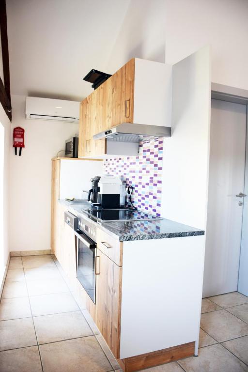 Kuchyň nebo kuchyňský kout v ubytování Apartment´s Marchtrenk