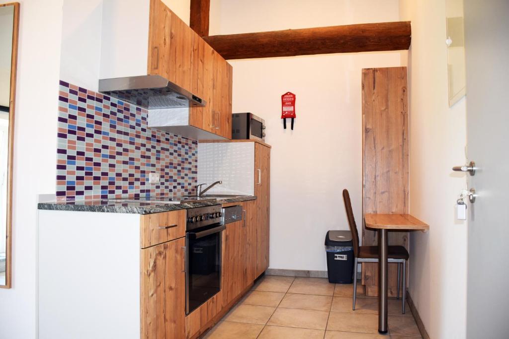 Kuchyň nebo kuchyňský kout v ubytování Apartment´s Marchtrenk