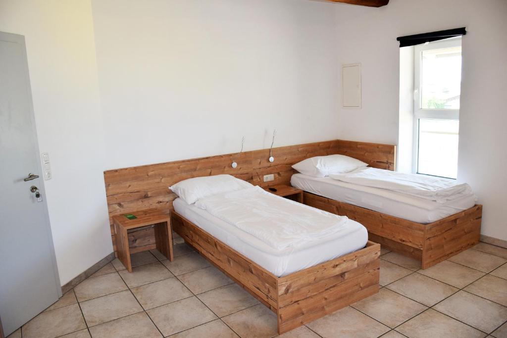 Postel nebo postele na pokoji v ubytování Apartment´s Marchtrenk