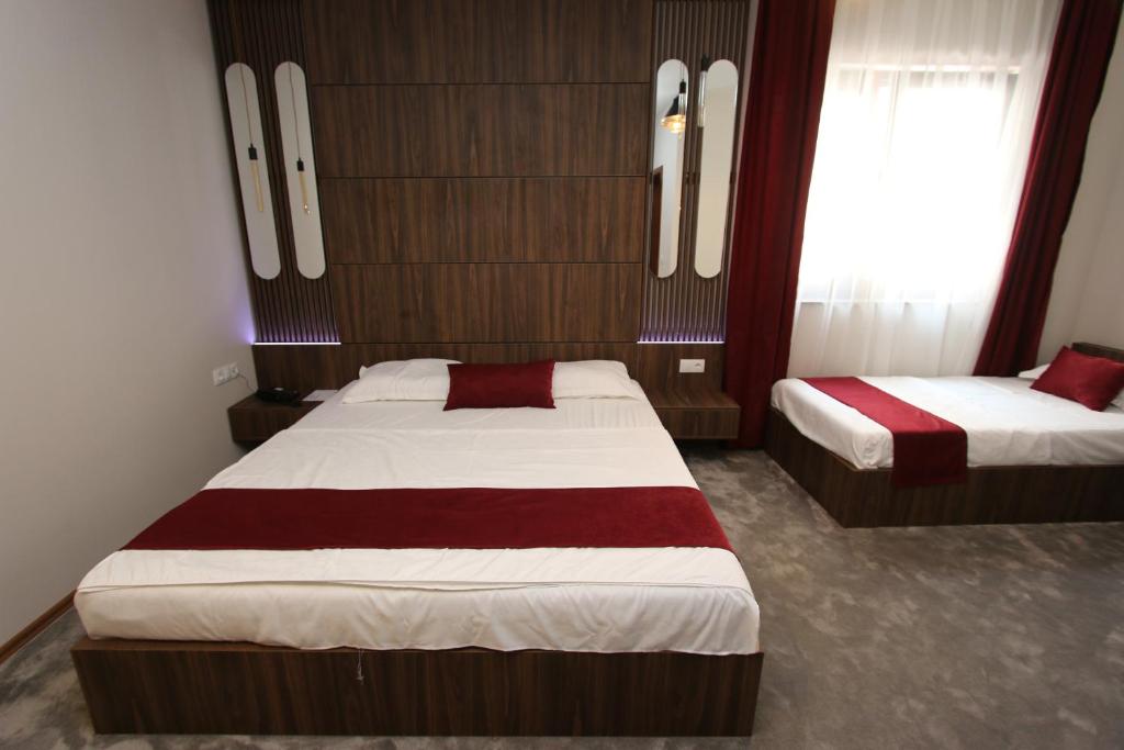 Postel nebo postele na pokoji v ubytování Prior Hotel