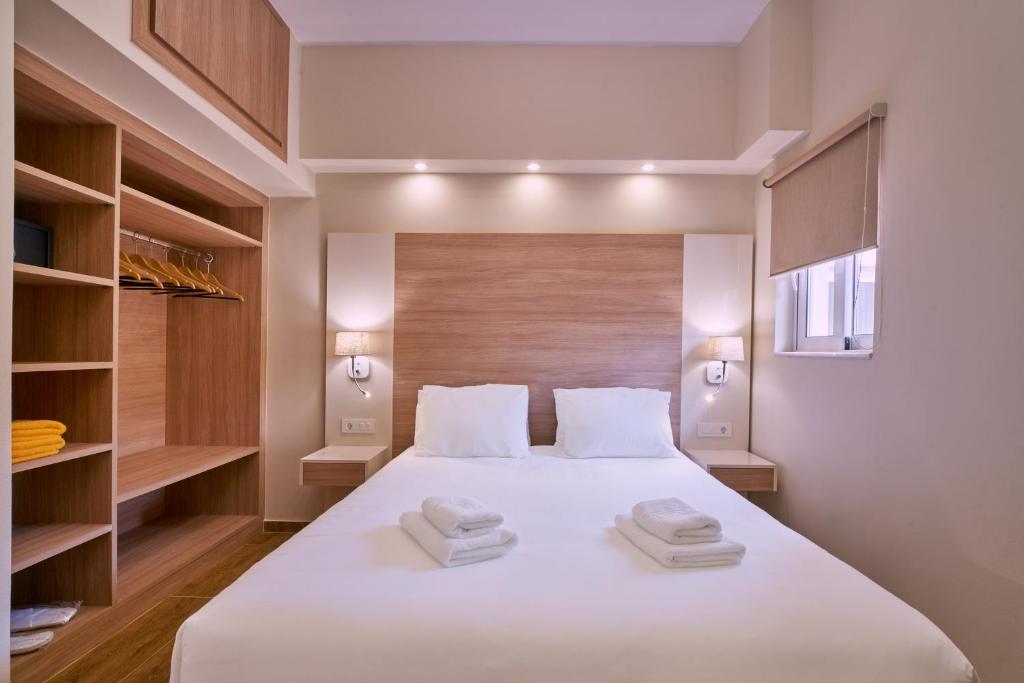Posteľ alebo postele v izbe v ubytovaní Emmanouela's Apts