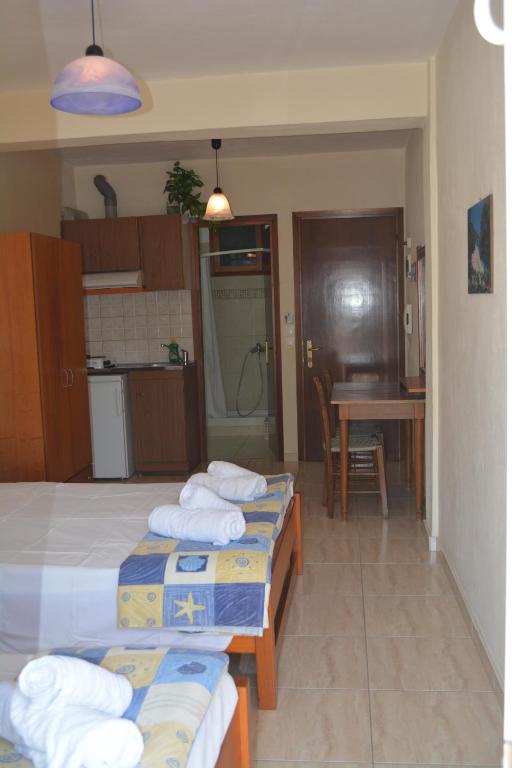 Kuchyň nebo kuchyňský kout v ubytování GLIKERIA ROOMS