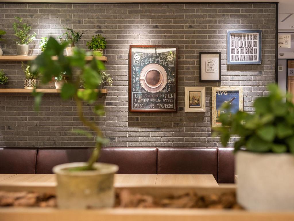 Posezení v ubytování Super Hotel Tottori Ekimae