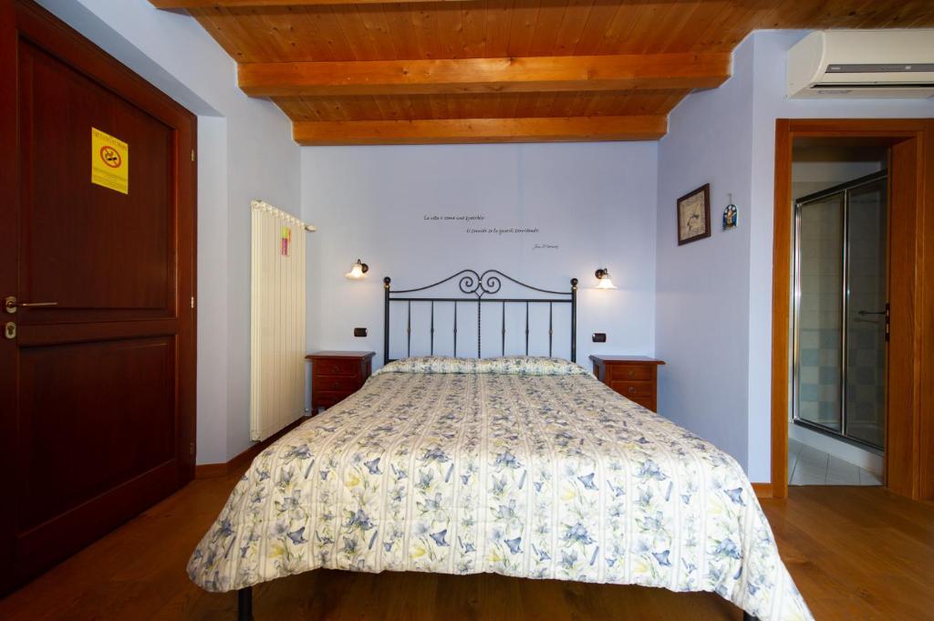 Posteľ alebo postele v izbe v ubytovaní Agriturismo Lis Rosis