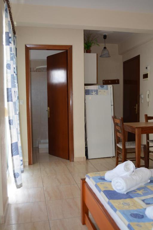 Kuchyň nebo kuchyňský kout v ubytování GLIKERIA ROOMS