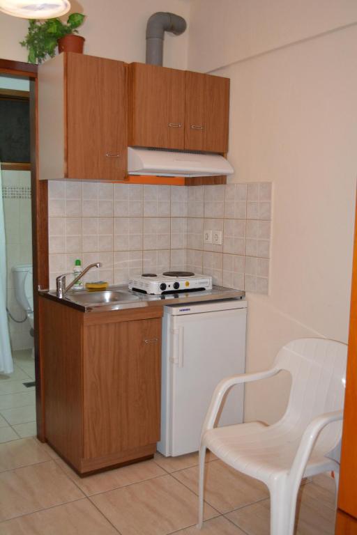 Kuchyň nebo kuchyňský kout v ubytování GLIKERIA ROOMS