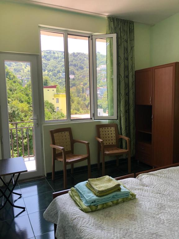 Postel nebo postele na pokoji v ubytování Sanni Guest House