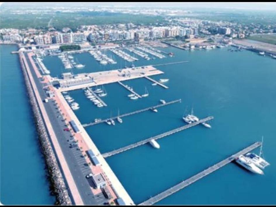 an aerial view of a marina with boats in the water at Diamond Beach 2 in Burriana