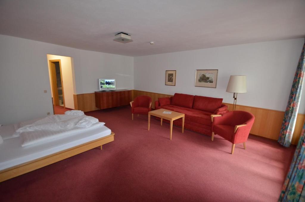 Postel nebo postele na pokoji v ubytování Posthotel Rössle