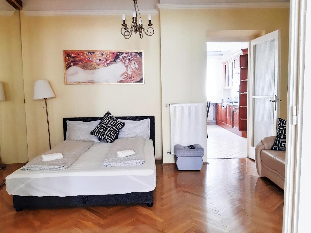 Posteľ alebo postele v izbe v ubytovaní Gold Rose Apartment with 3 rooms