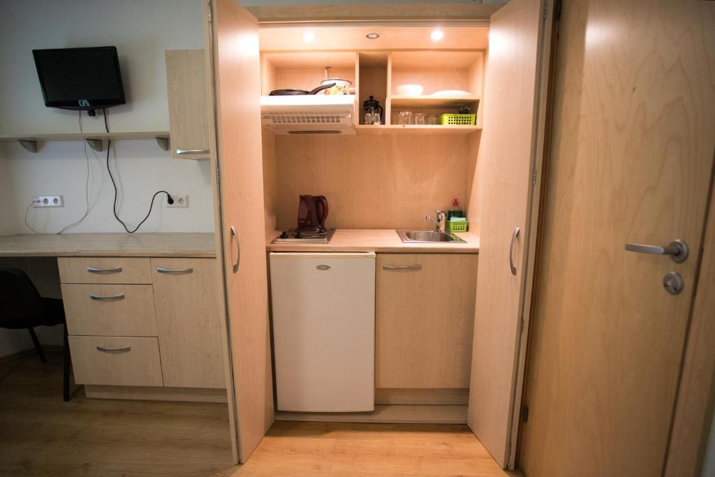 Kuchyň nebo kuchyňský kout v ubytování Viisnurga Puhkemajad