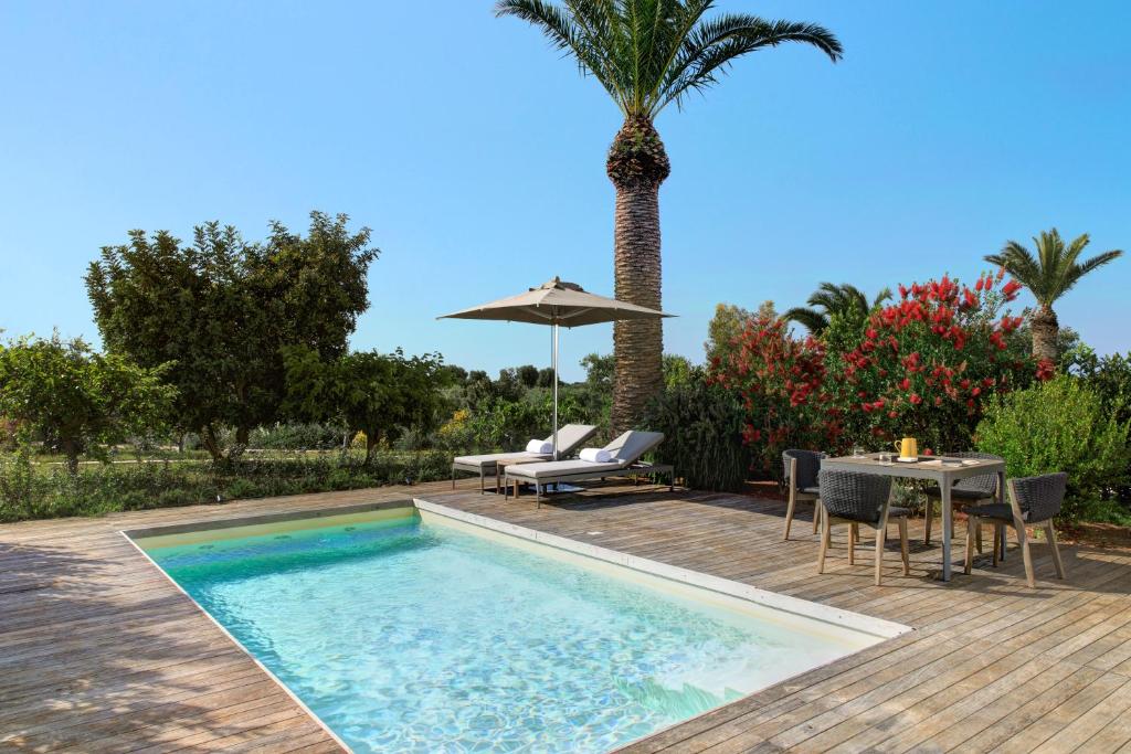 Bazén v ubytování Rocco Forte Masseria Torre Maizza nebo v jeho okolí