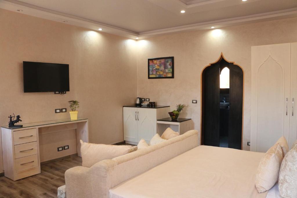TV a/nebo společenská místnost v ubytování Casa D'or Dahab