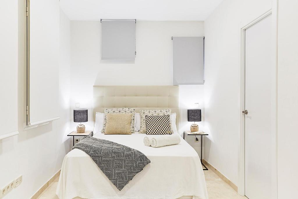 Postel nebo postele na pokoji v ubytování LEEWAYS LOFT IV in GRAN VÍA