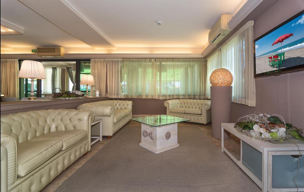 TV a/nebo společenská místnost v ubytování Hotel Siesta