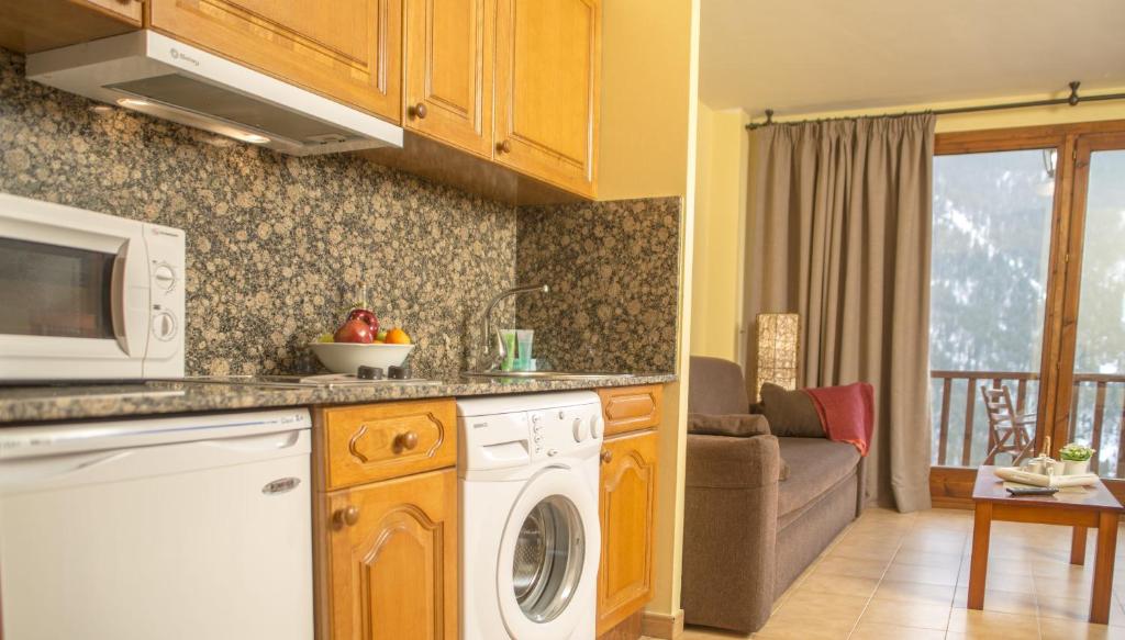 Kuchyň nebo kuchyňský kout v ubytování Aparthotel Ona el Tarter