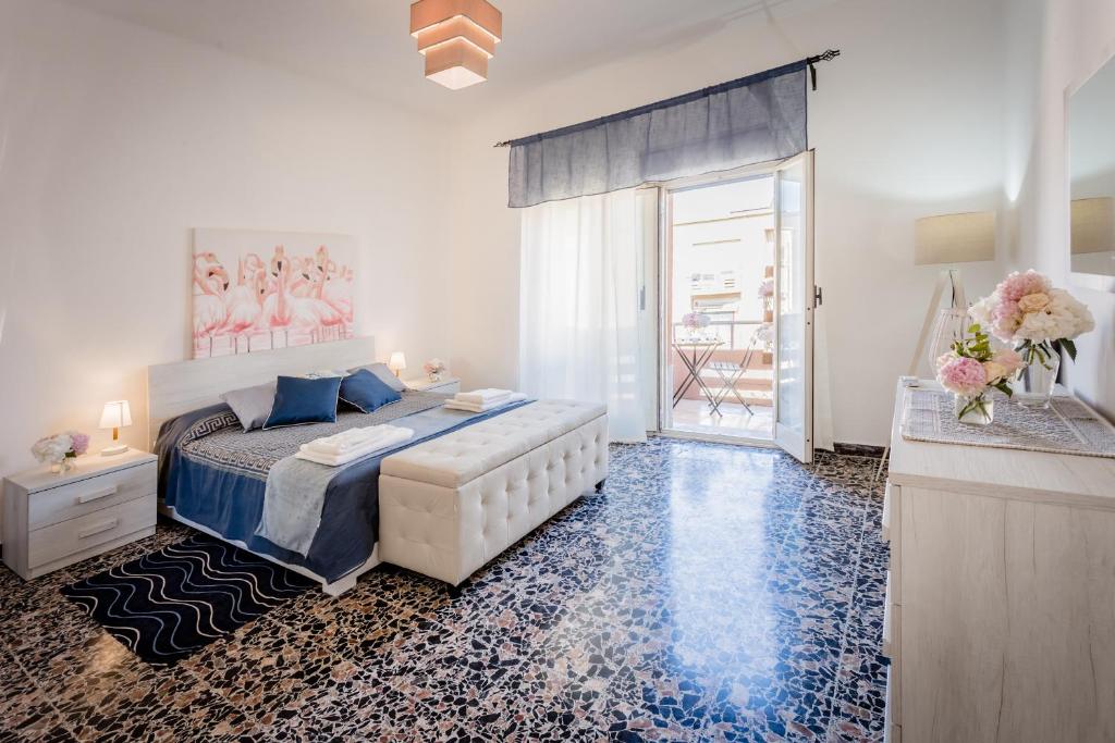 Postel nebo postele na pokoji v ubytování "Un Posticino Carino" Camere Cagliari