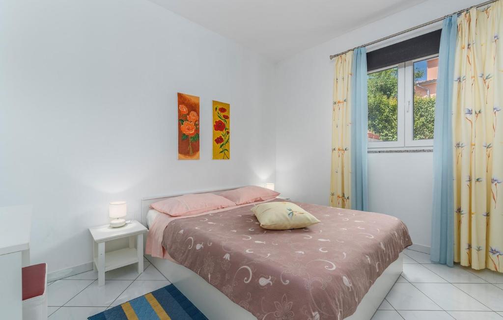 Postel nebo postele na pokoji v ubytování Apartments Baldini