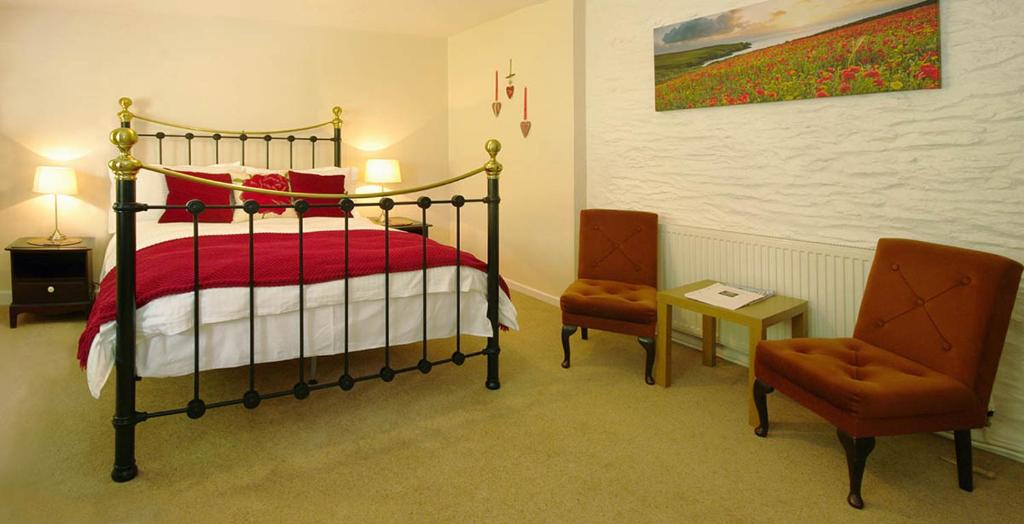 Postel nebo postele na pokoji v ubytování Natal House Bed & Breakfast