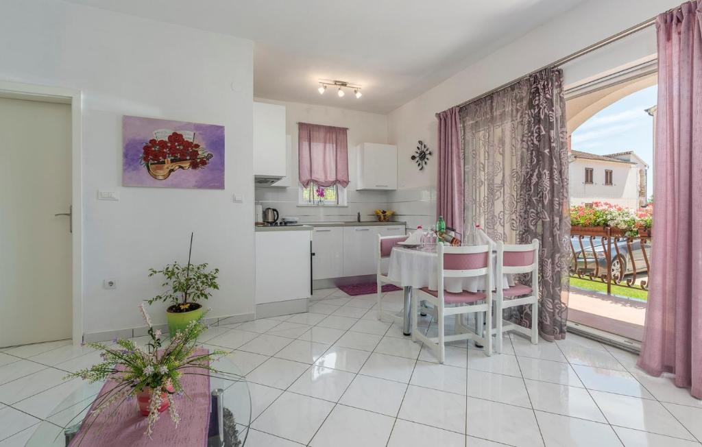 Kuchyň nebo kuchyňský kout v ubytování Apartments Baldini