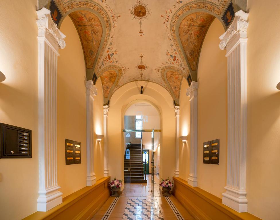 a hallway of a building with a ceiling at Residence Jecna in Prague