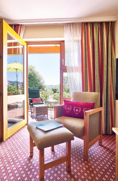 Posezení v ubytování Hotel An der Brunnader - Die Therme befindet sich 4 Geh-Minuten entfernt