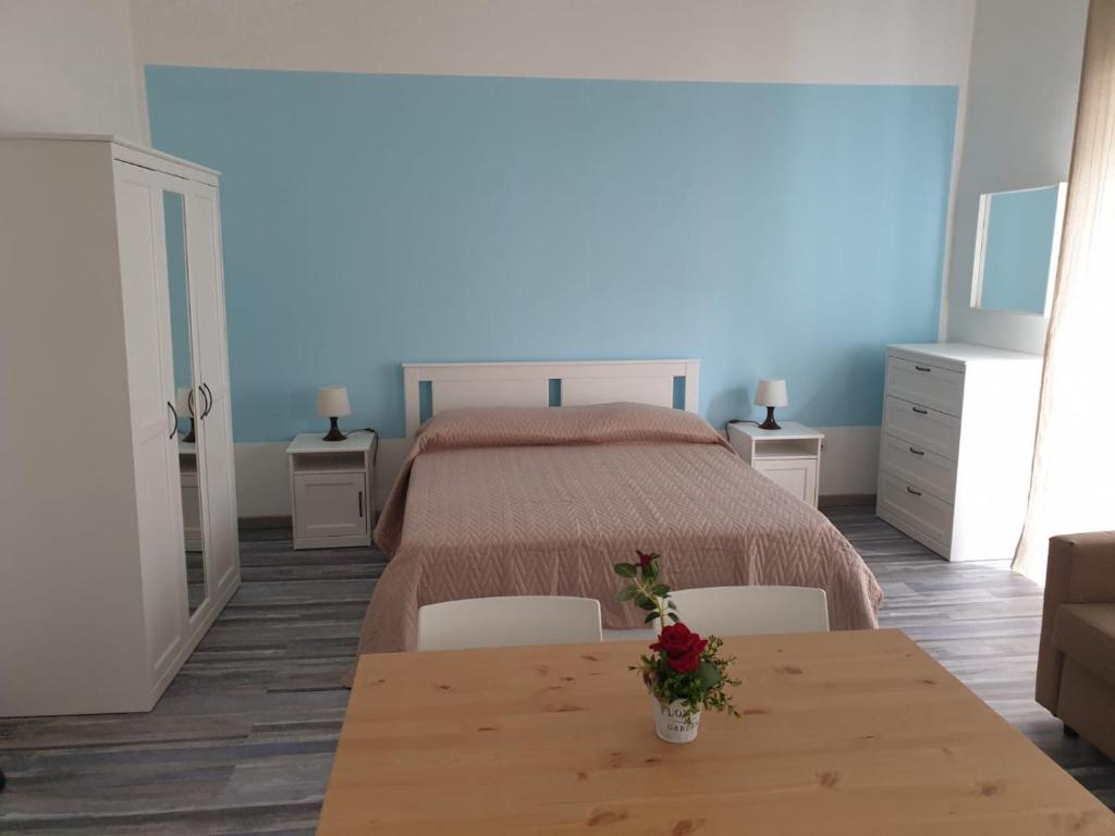Postel nebo postele na pokoji v ubytování Lipari Suite Apartament