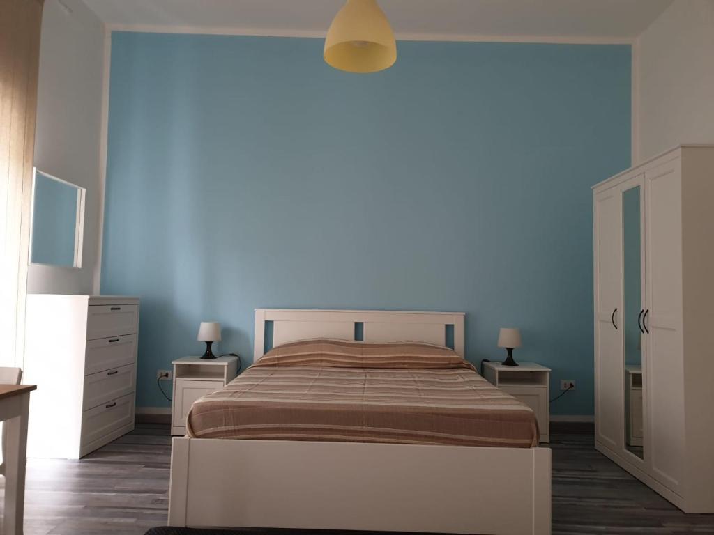 Postel nebo postele na pokoji v ubytování Lipari Suite Apartament