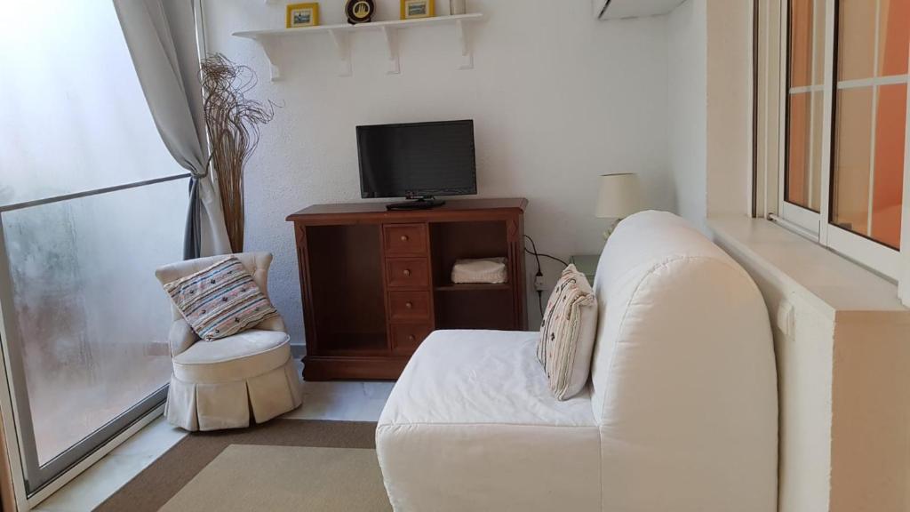 TV a/nebo společenská místnost v ubytování Townhouse Mar y Sol
