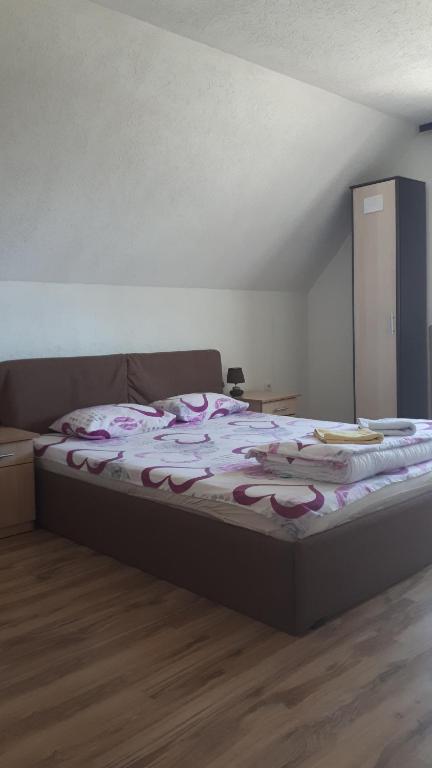 Postel nebo postele na pokoji v ubytování Golubović Apartments