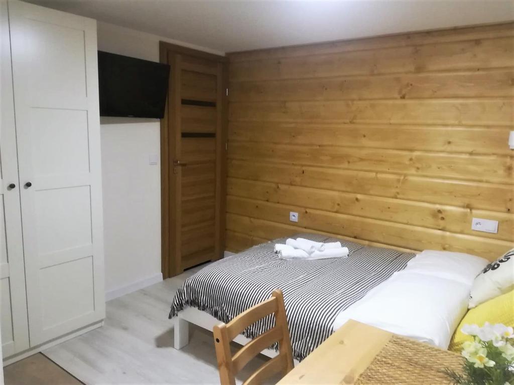 Postel nebo postele na pokoji v ubytování Apartamenty Milka