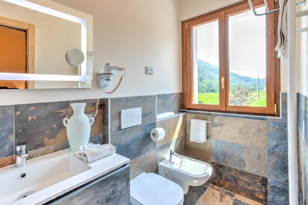 Koupelna v ubytování Hotel Aurora