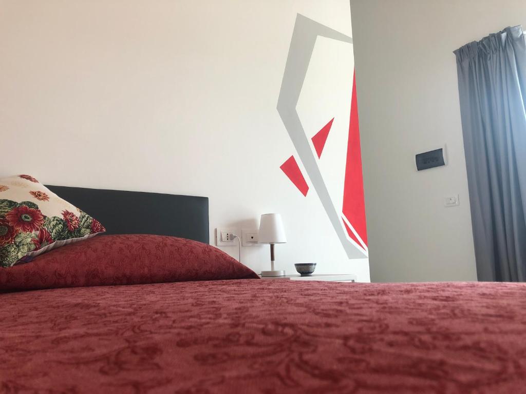 Postel nebo postele na pokoji v ubytování Il Platano Residenza Rurale