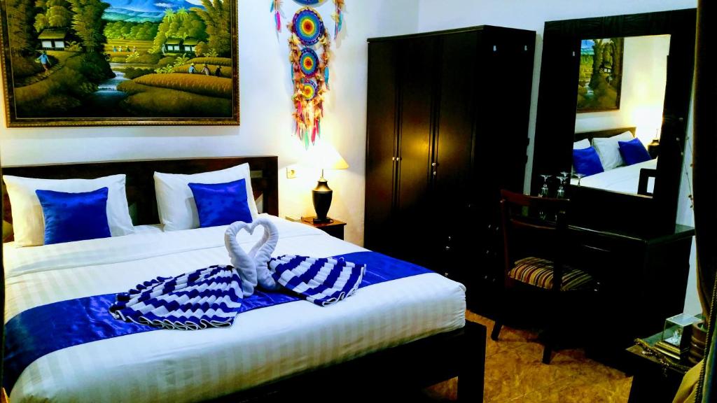 Postel nebo postele na pokoji v ubytování Cantik Villa