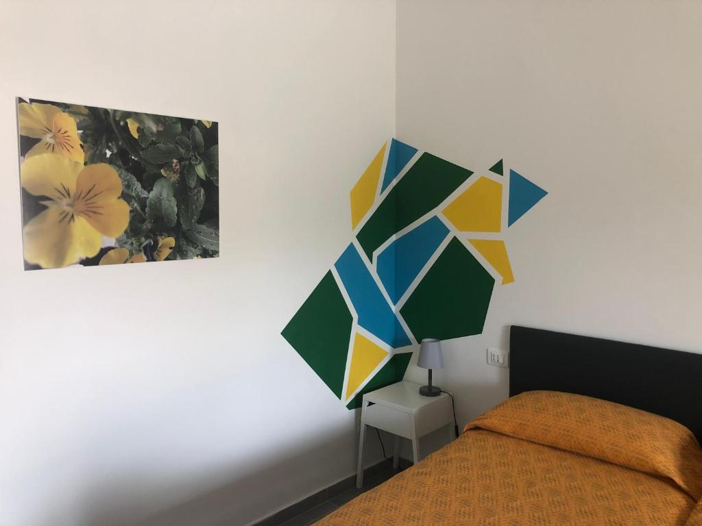 Postel nebo postele na pokoji v ubytování Il Platano Residenza Rurale