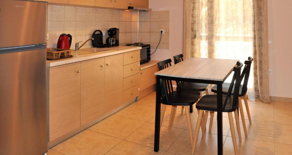 Kuchyň nebo kuchyňský kout v ubytování Houses Nikolaos