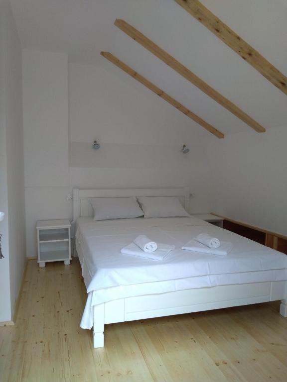 Postel nebo postele na pokoji v ubytování Guest House Dzakovic Stana
