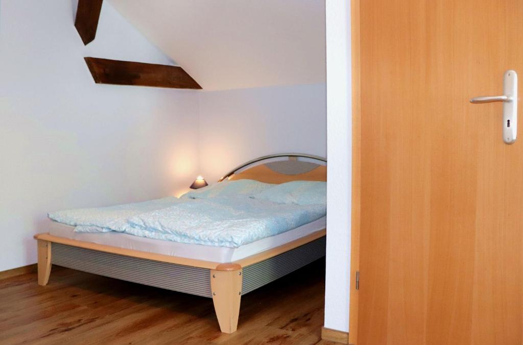 Postel nebo postele na pokoji v ubytování Pension Kuhn