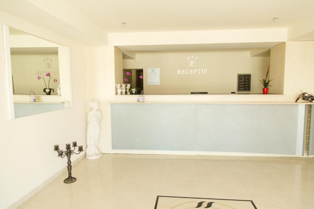 a dressing room with a mirror and a counter at Eden in Timişoara